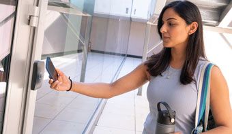 woman entering building