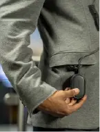 Close up of oval-shaped TLK 25 communications device