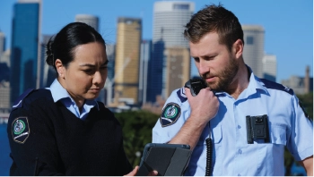 Two officers looking at WAVE PTX screen on ipad