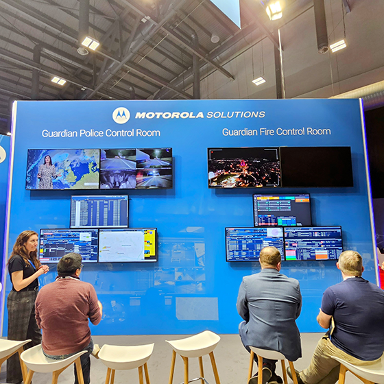 Motorola Solutions employee showing products at event