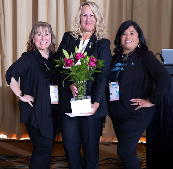 3 women pose for a photo
