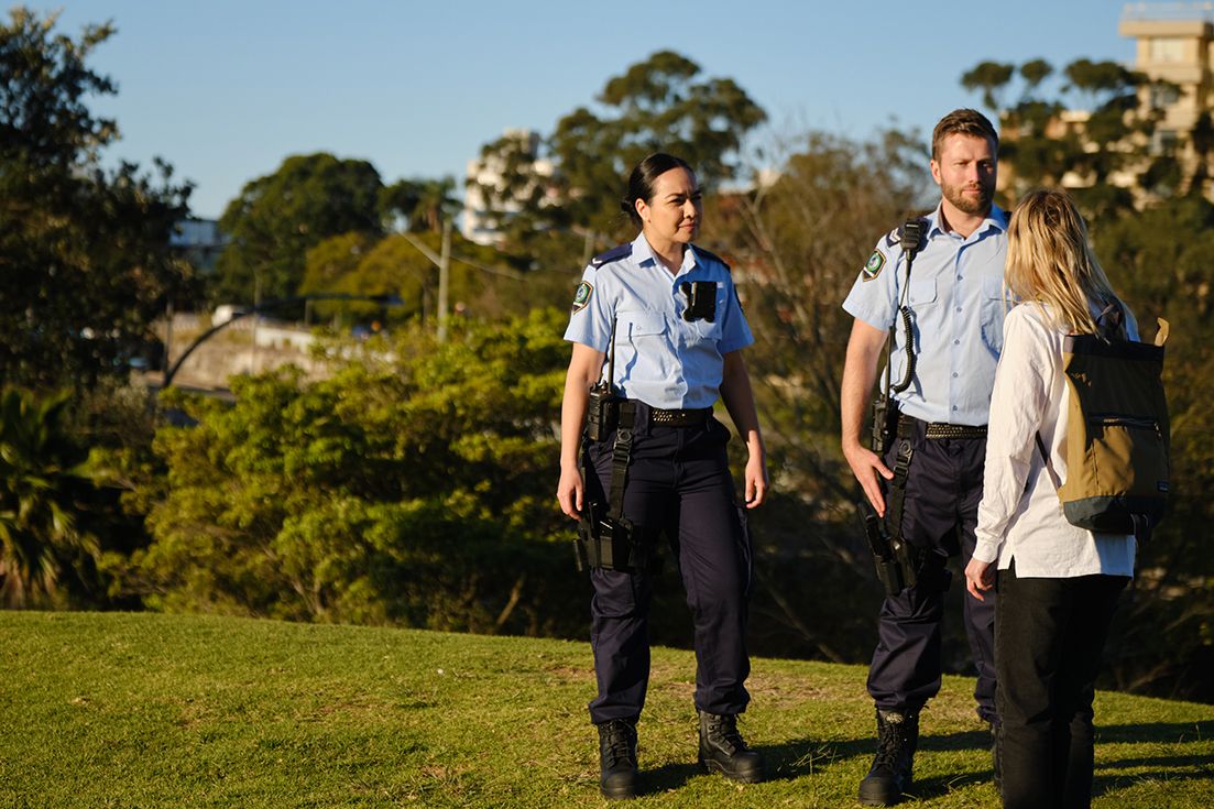 Police officer with SmartLocate GPS location-enabled radio approaches a home