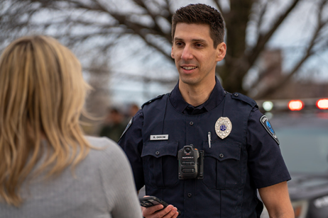 Police officer talking to citizen