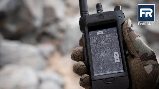 Police officer with SmartLocate GPS location-enabled radio approaches a home