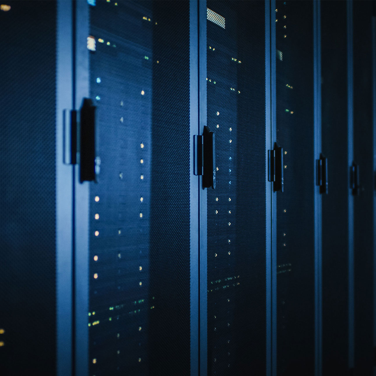 Shot of Dark Modern Data Center With Row of Fully Operational Server Racks. Modern Hi-Tech Concept for Cloud Computing, Artificial Intelligence, Supercomputer, Cybersecurity