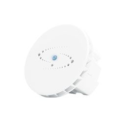 White circular sensor device with blue light indicator in the device's center