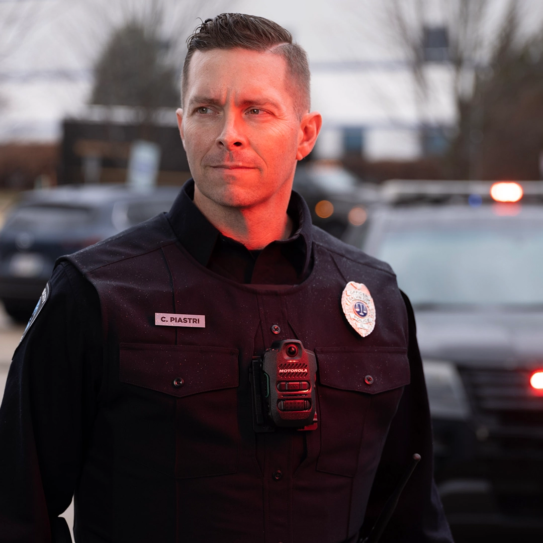 Police officer with Motorola SVX on chest