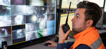 Mining security worker uses MOTOTRBO radios to secure the grounds. 