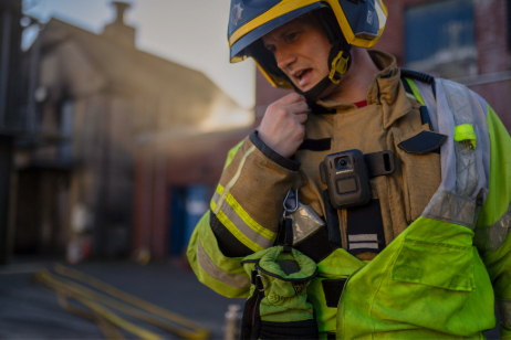 Firefighter talking into radio