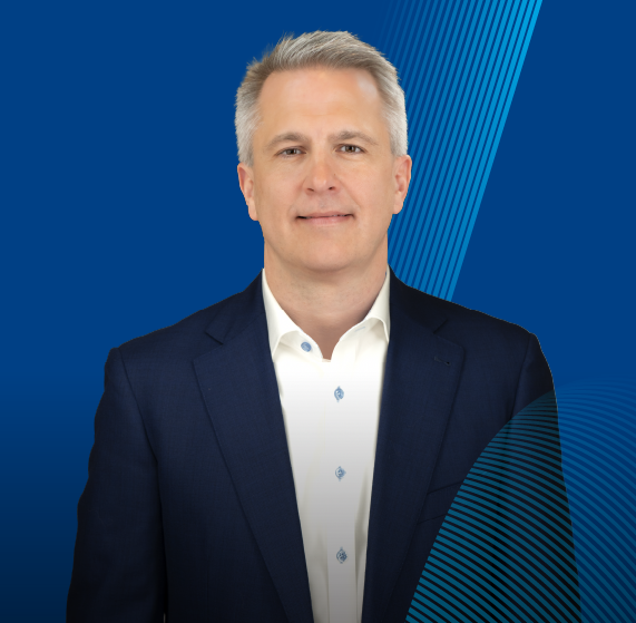 Image of a MSI's CFO Jason Winkler with a blue background